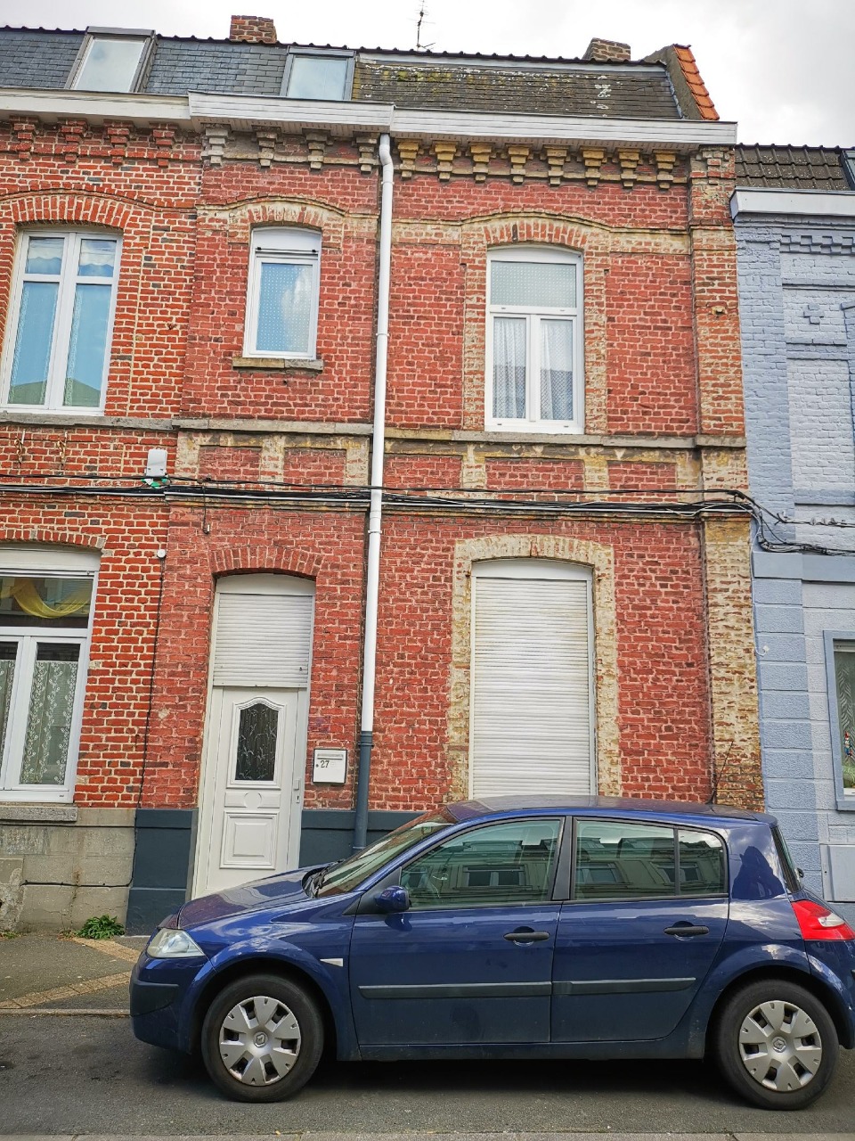 Maison 4 chambres avec extérieur en plein centre ville.
